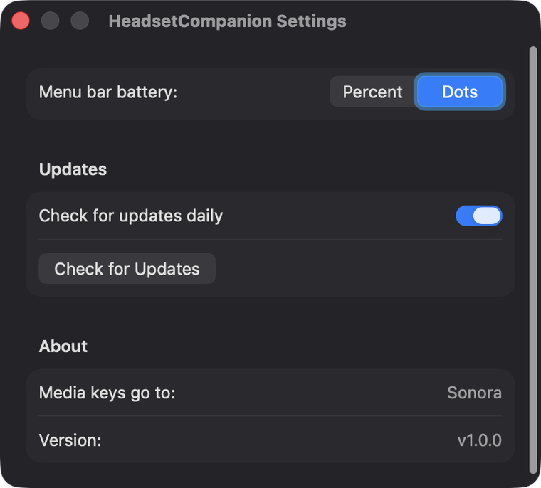 The Settings panel: menu bar battery style, start at login, daily update check, media-key routing, and the version number